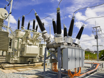 View of electrical wires, poles and transformers